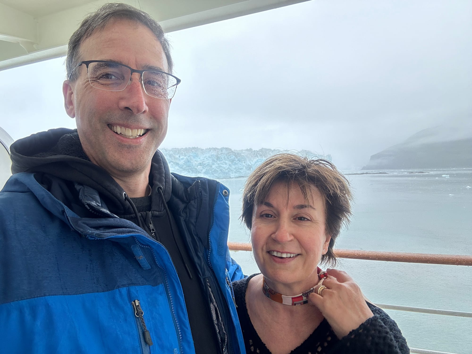 Photo of Ted & Galina viewing Hubbard Glacier from our balcony