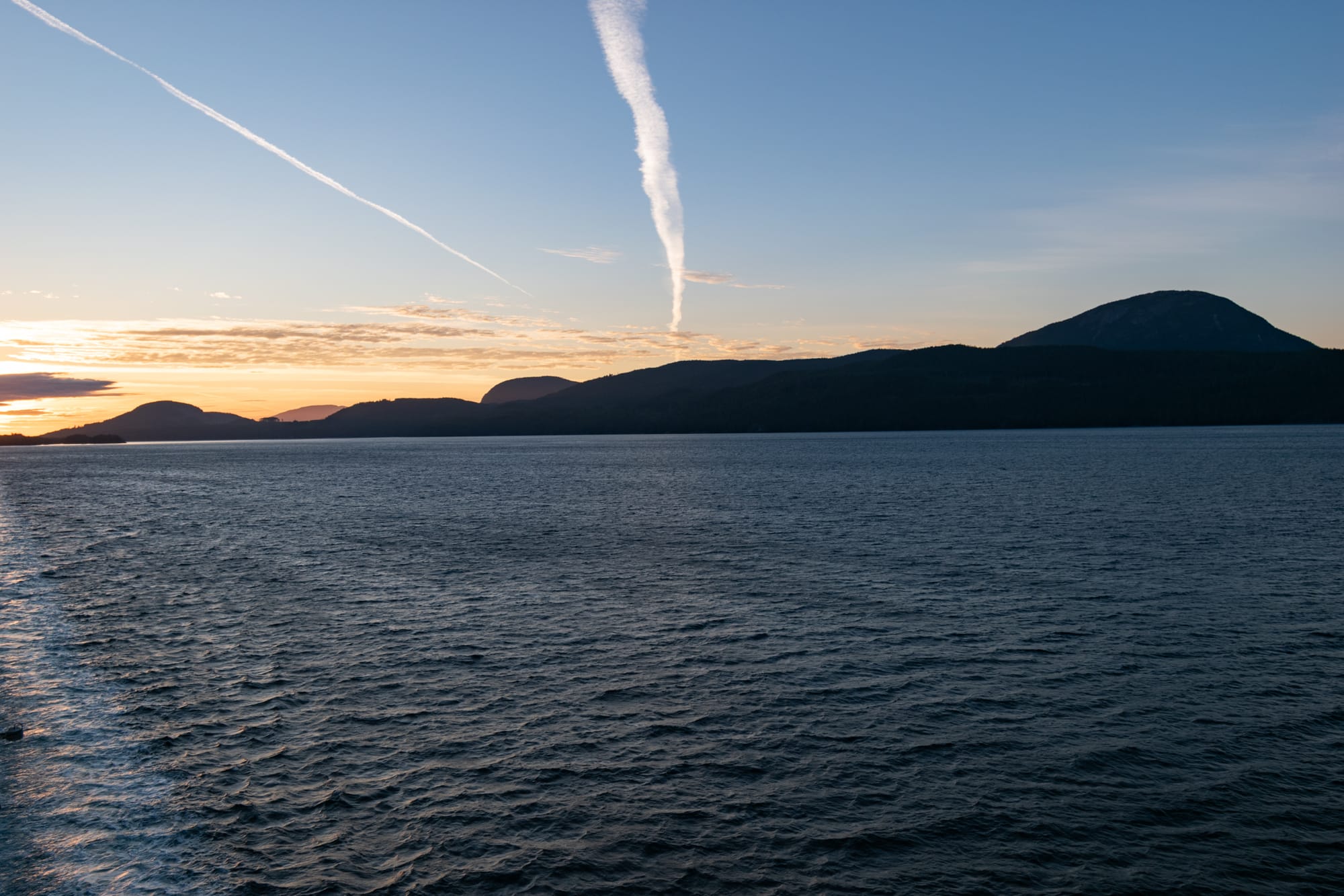 Inside passage transit - mountains at sunset