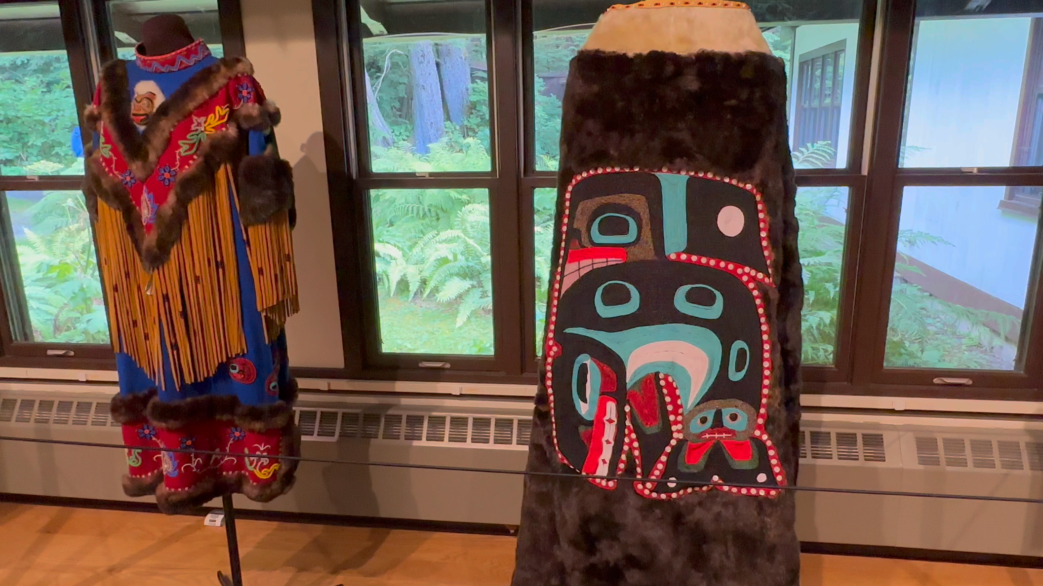 Photo of Tlingit decorated formal wear on display.