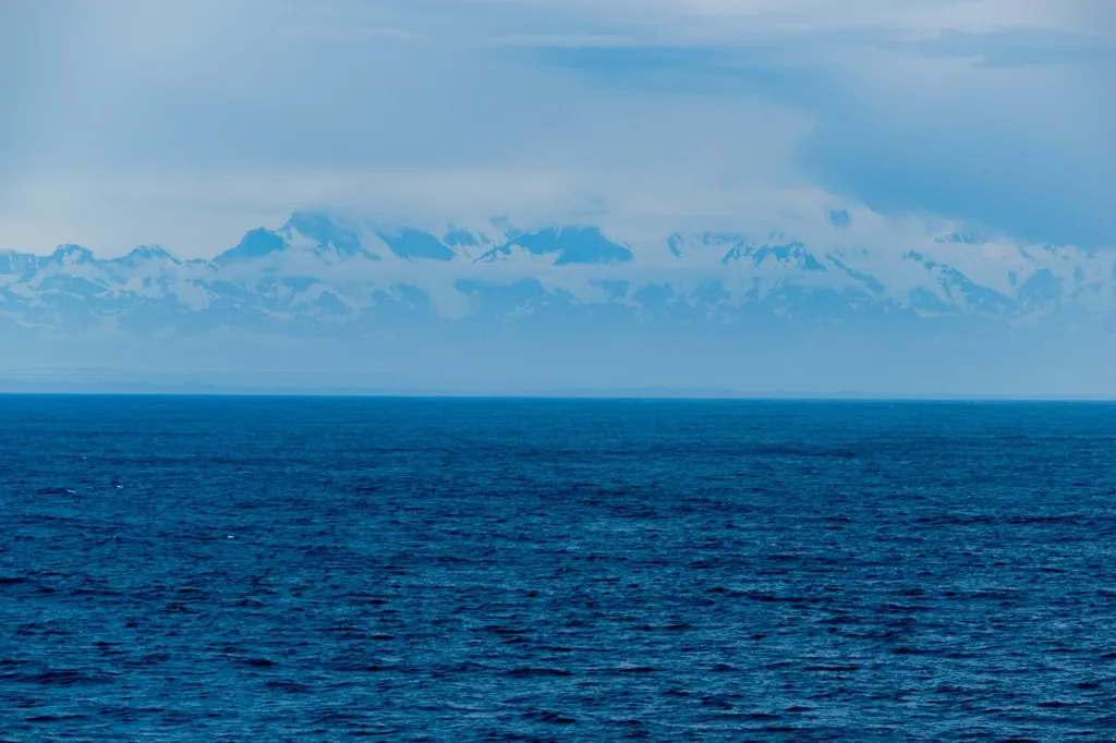 Photo of a majestic mountain in the clouds