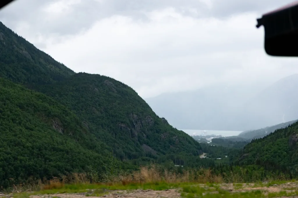 Photo of Skagway and mountains before entering the clouds